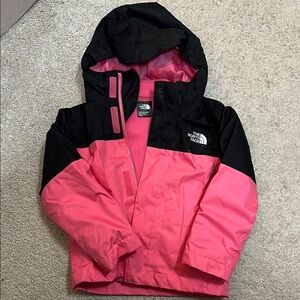 The North Face Pink and Black Raincoat with Hood and Weather-Resistant Material